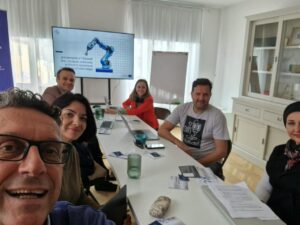 6 project managers facing the camera